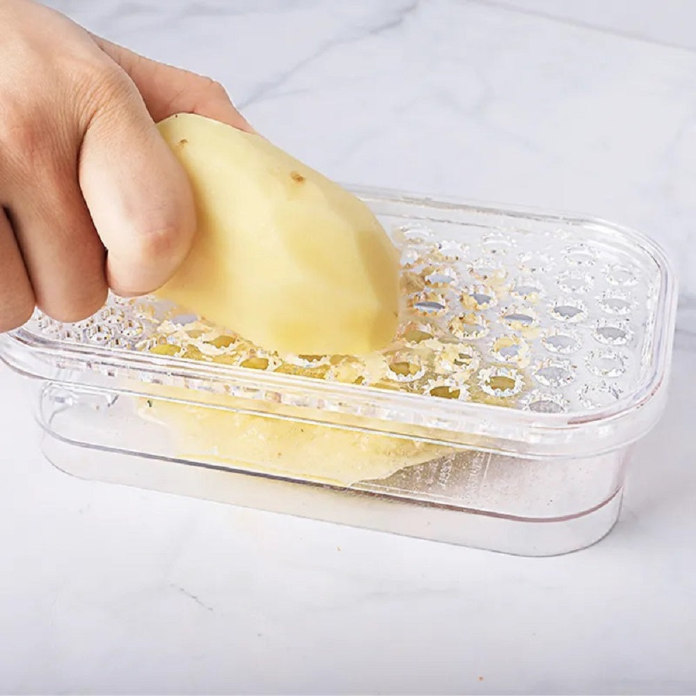 PLASTIC GRATER WITH SUCTION - CLEAR